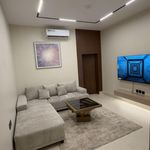 شقة بغرفة معيشة وغرفة نوم