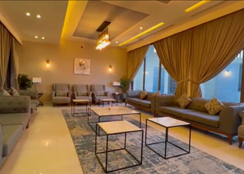 شاليه بمسطح اخضر وجلسة خارجية 