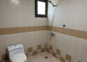 شقة عائلية غرفة نوم وصالة جلوس
