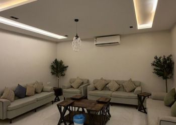 شاليه بمسطح اخضر وجلسة خارجية 