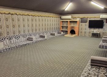 استراحة بجلسة خارجية ومسطح اخضر