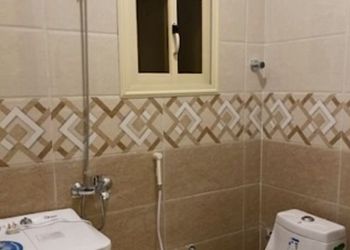 شقة بغرفة معيشة وغرفة نوم 