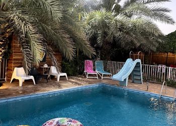 استراحة بمسبح وجلسة خارجية 