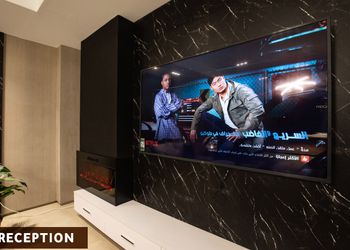 شقة أنيقة بصالة وغرف نوم