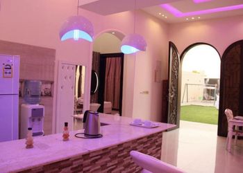 شاليه بألعاب مائية ومسطح اخضر