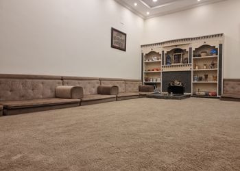 استراحة بمسطح اخضر وجلسه خارجيه