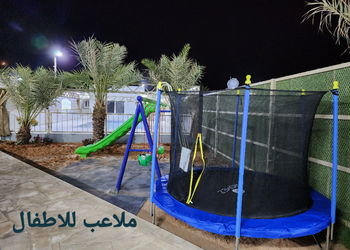 استرحه قسمين بمسبح ومسطحات خضراء