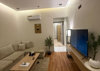 شقة بغرفة معيشة وغرفة نوم 