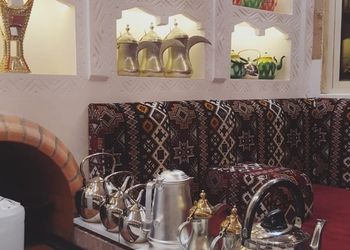 شاليه بمسطح اخضر وجلسة خارجية