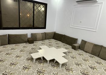 شاليه بمسطح اخضر وجلسة خارجية 