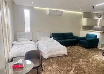 استديو بسريرين فردية وجلسة جانبية