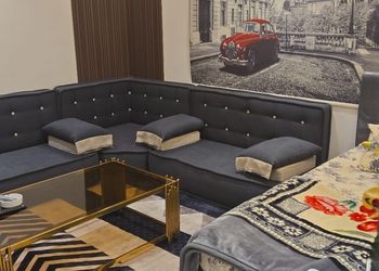 استديو بسرير فردي وجلسة جانبية