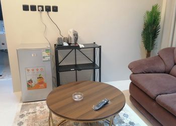 استديو بسرير ماستر وجلسة مريحة 