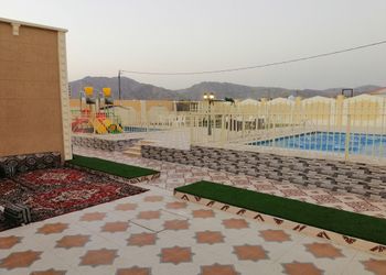 استراحة بجلسة خارجية ومسبح خارجي 