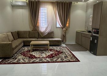 شقة بغرفة معيشة وغرفة نوم 