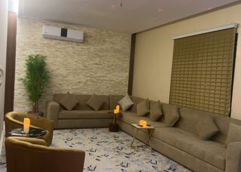 شاليه بمسطح اخضر وجلسة خارجية 