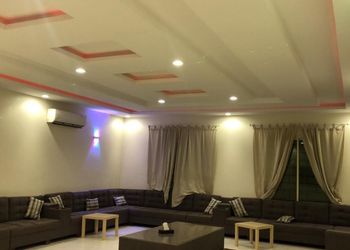 شاليه بمسطح أخضر وألعاب أطفال