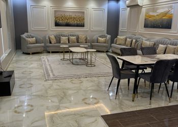 شاليه بمسطح اخضر وجلسة خارجية 