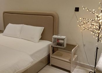 استديو بسرير ماستر وجلسة مريحة 
