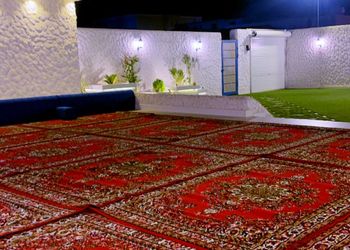 استراحة بجلسة خارجية ومسطح اخضر