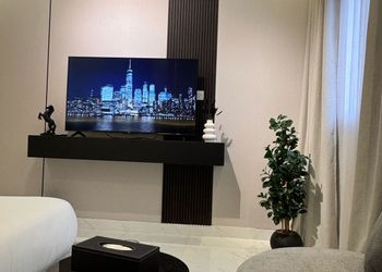 استديو بسرير ماستر وجلسة جانبية