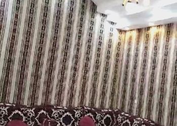شاليه بمسطح اخضر وجلسة خارجية 