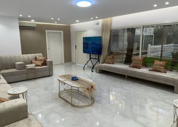 شاليه بمسطح اخضر وجلسة خارجية 