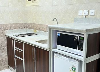 استديو بسرير ماستر وجلسة جانبية 