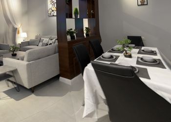 شاليه بجلسة تطل على مسبح خارجي 