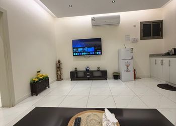 شقة بغرفة معيشة وغرفة نوم