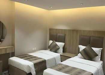 استديو بسريرين مفرد بطابع فندقي