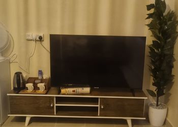 استديو بسرير ماستر وجلسة مريحة 