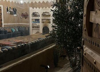 استراحة بمسطحات خضراء وملاعب