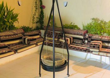 شاليه بألعاب أطفال وجلسة خارجية 