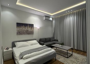 استديو بتصميم أنيق وسرير ماستر 