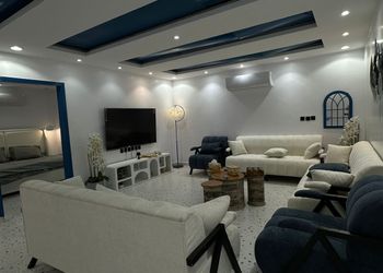 شاليه بطابع يوناني وطاولة تنس