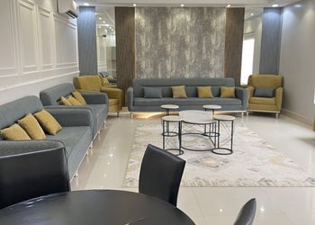 شاليه بمسطح اخضر وجلسة خارجية 