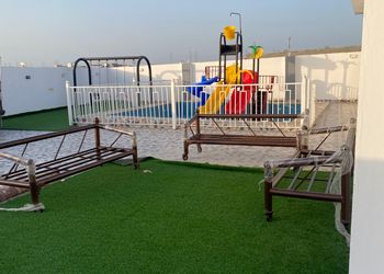 استراحة بمسطح اخضر والعاب مائية
