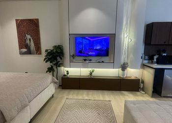 استديو بسرير ماستر وجلسة جانبية 