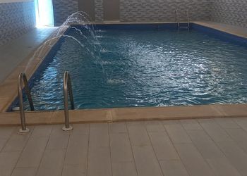  استراحة بمسطح اخضر وجلسة 