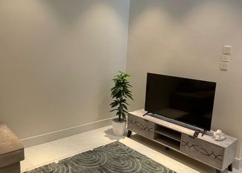 استديو بسرير فردي وجلسة جانبية