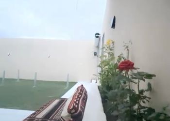 شاليه بألعاب أطفال وجلسة خارجية 