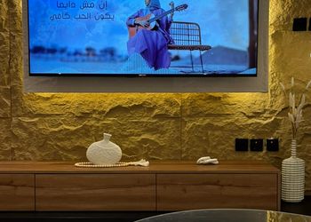 غرفة نوم وصالة بتصميم مميز