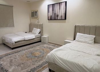شقة بغرفتين نوم وأثاث هادئ