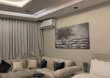 استديو انيق بسرير ماستر وجلسة جانبية 
