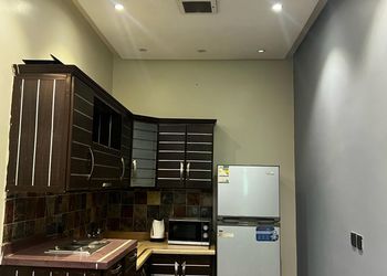 شاليه بجلسة خارجية وألعاب أطفال