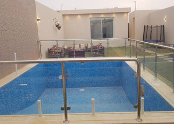 شاليه بألعاب أطفال ,موقد حطب,مسطح اخضر,