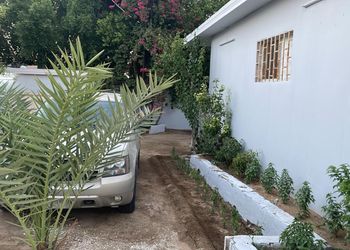 استراحة بجلسة خارجية ومسطح اخضر