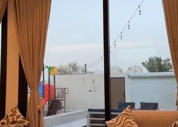 شاليه بألعاب مائية وجلسة خارجية