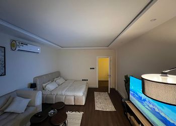 استديو بسرير ماستر وجلسة جانبية 